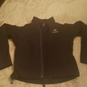 Black Arcteryx lightweight shell jacket